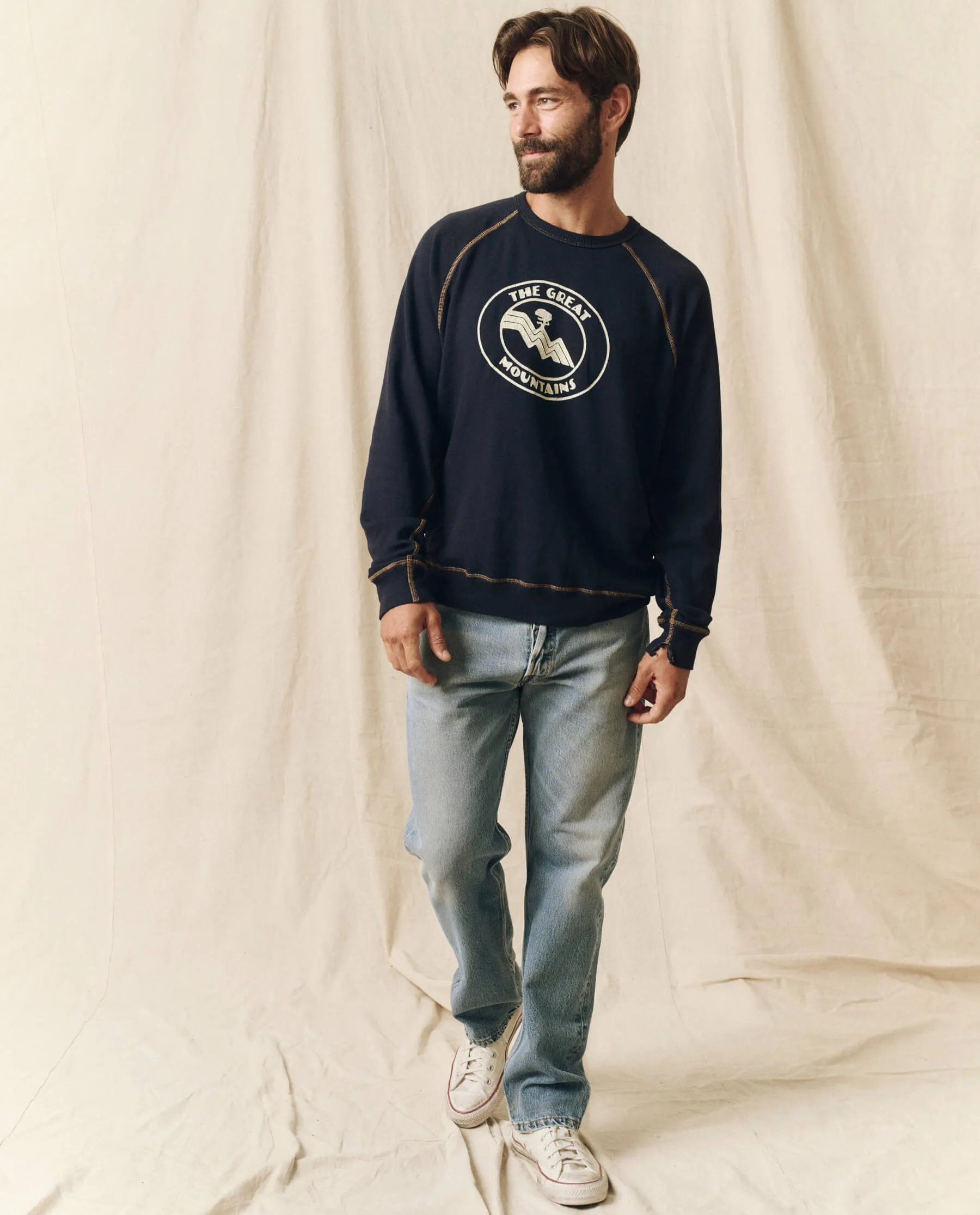 The Men's College Sweatshirt. Graphic -- Stargazer Blue with Mountain Resort Graphic