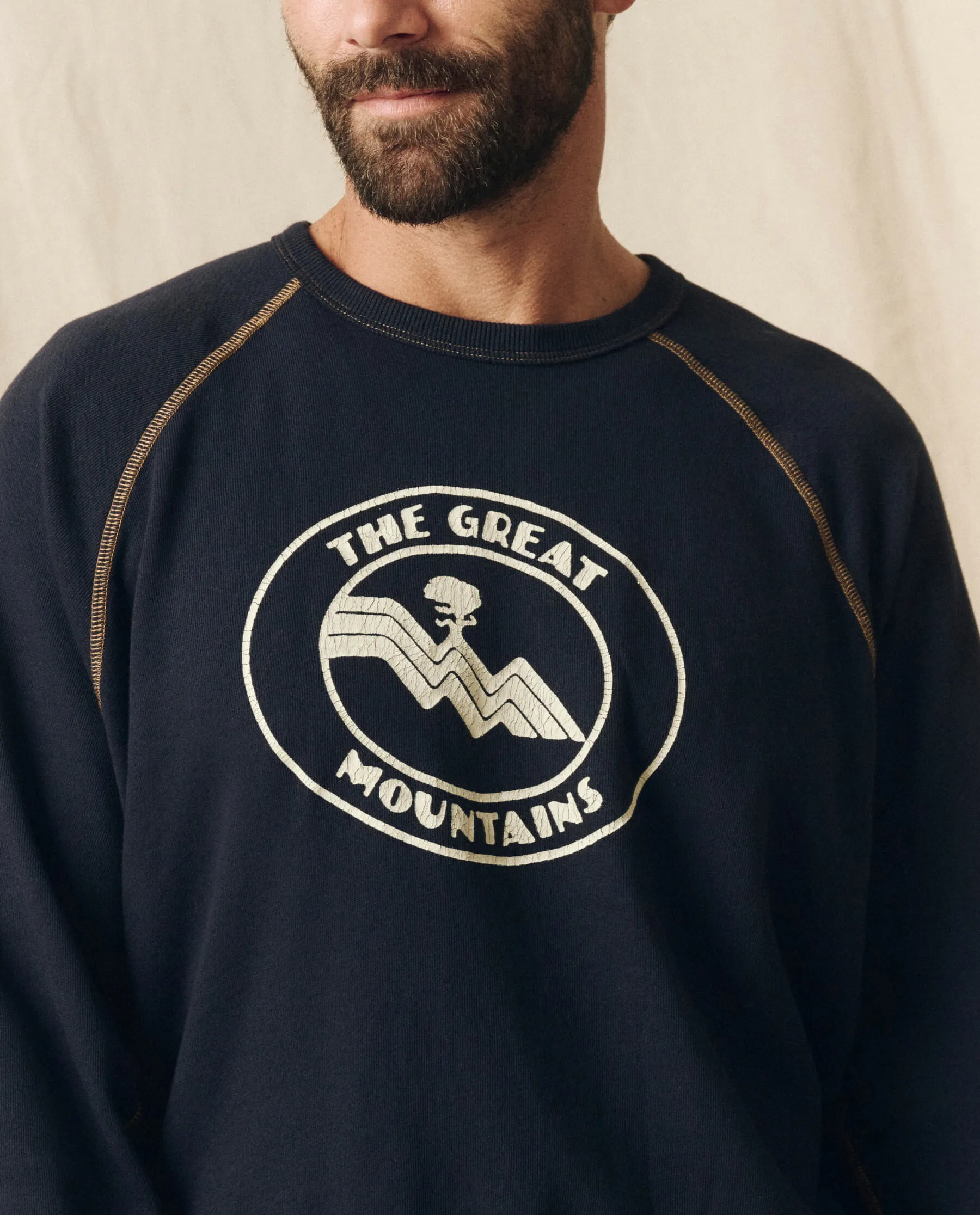 The Men's College Sweatshirt. Graphic -- Stargazer Blue with Mountain Resort Graphic