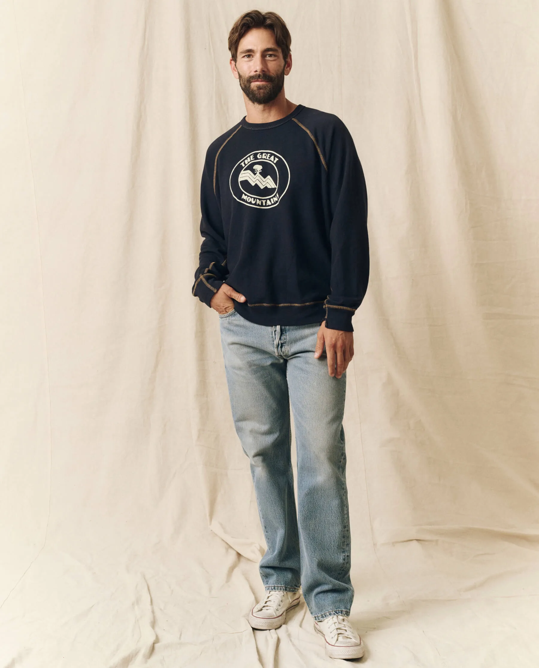 The Men's College Sweatshirt. Graphic -- Stargazer Blue with Mountain Resort Graphic