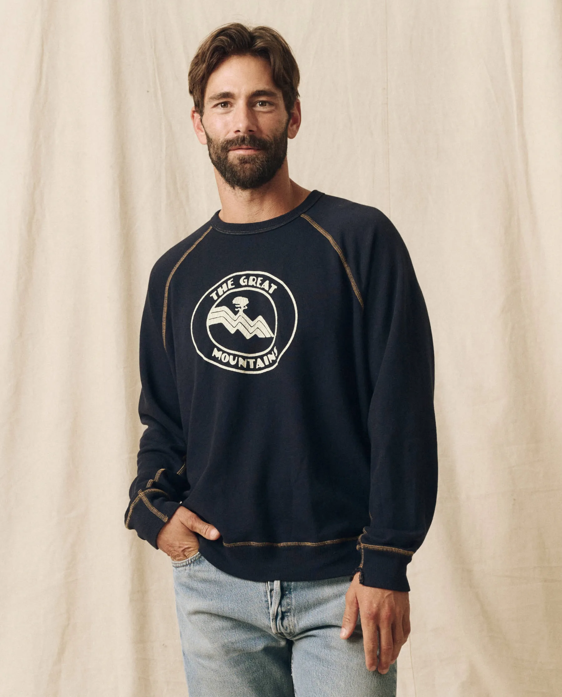 The Men's College Sweatshirt. Graphic -- Stargazer Blue with Mountain Resort Graphic